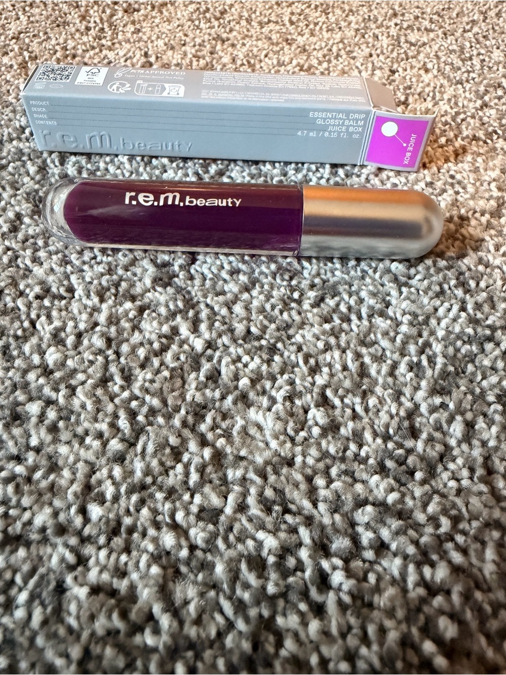R.E.M Beauty Essential Drip Glossy Balm in Deep Plum